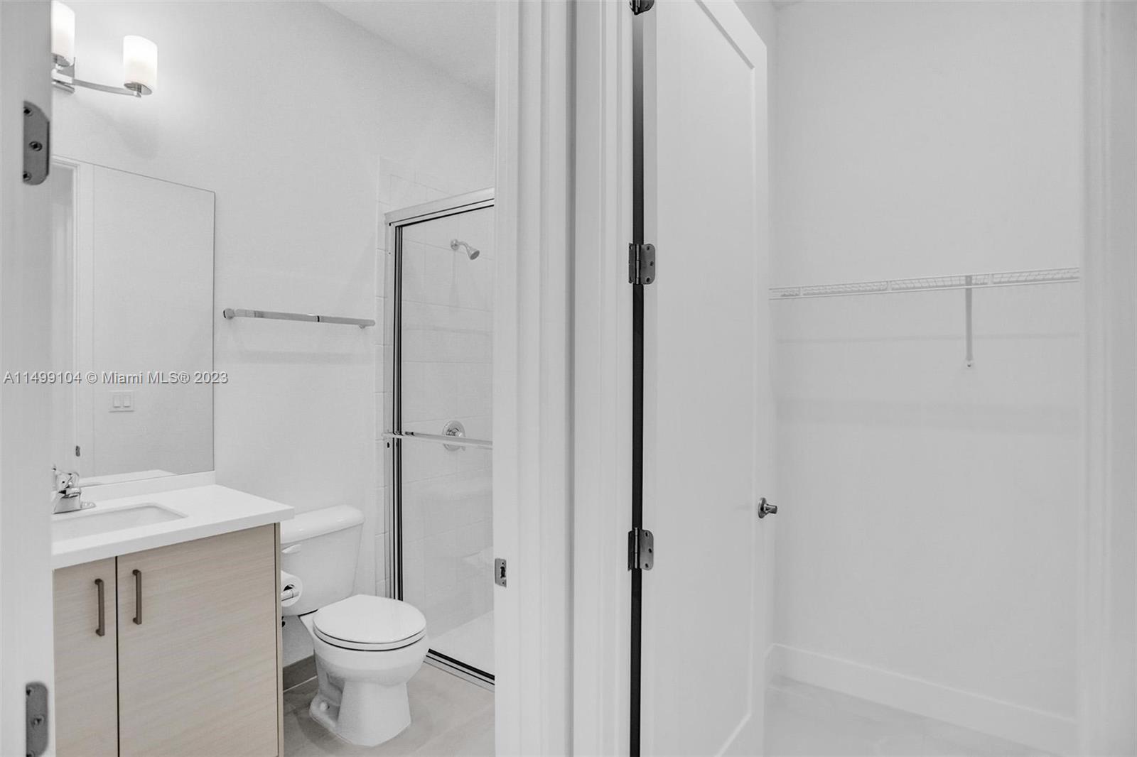 17185 Teton River Road Boca Raton, FL 33496 - Photo 8 of 89 a bathroom with a sink a toilet and shower