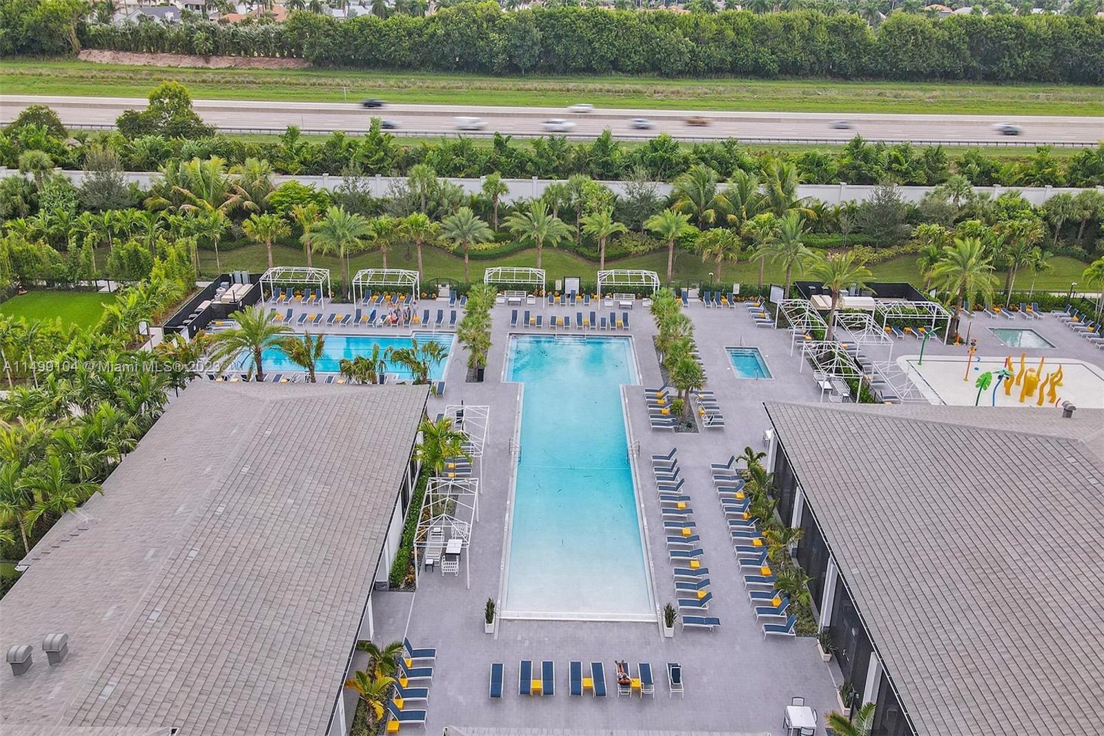 17185 Teton River Road Boca Raton, FL 33496 - Photo 84 of 89 an aerial view of a house with outdoor space swimming pool and lake view