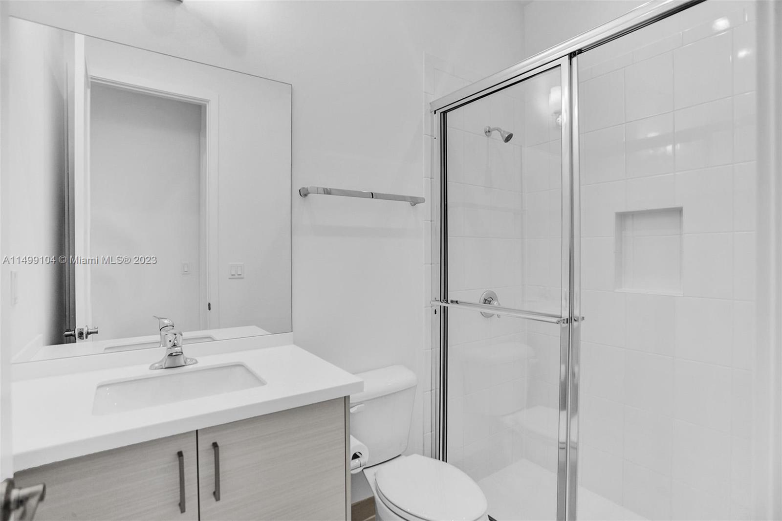 17185 Teton River Road Boca Raton, FL 33496 - Photo 9 of 89 a bathroom with a sink toilet and shower