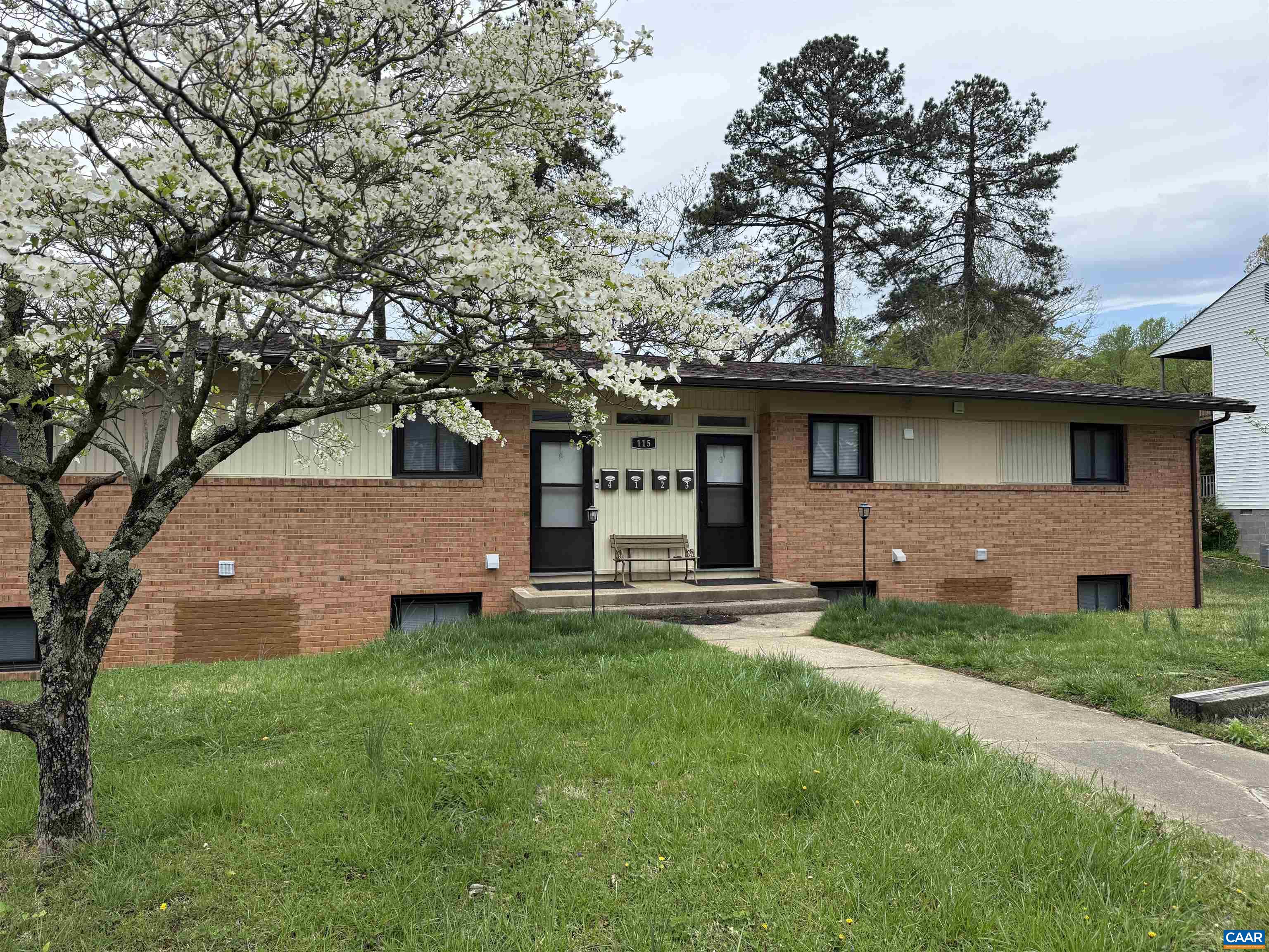 115 Apple Tree Road Charlottesville, VA 22903 - Photo 1 of 11 front view of a house with a yard