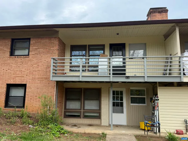 a front view of a house with parking