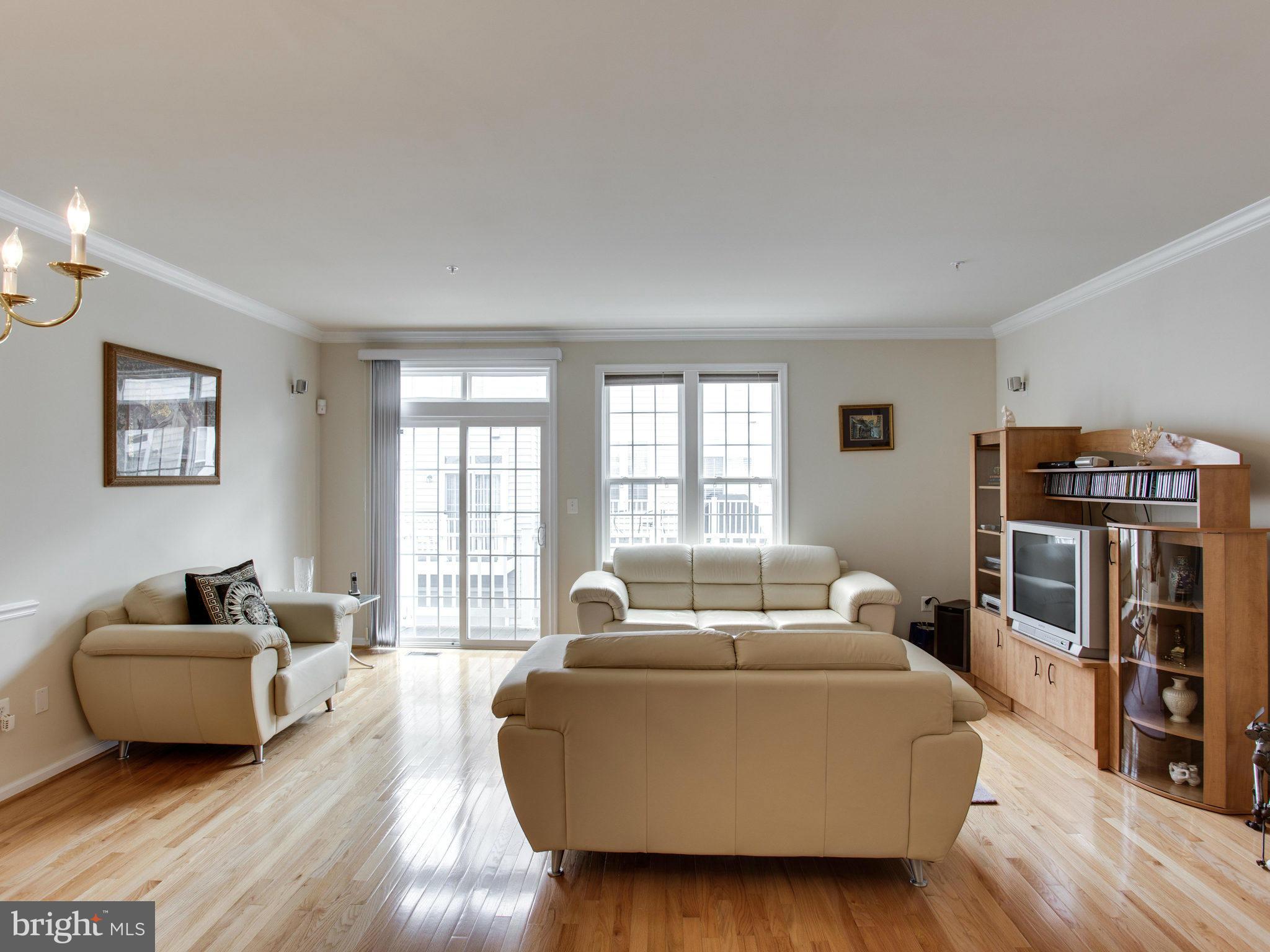 9823 Darcy Forest Drive Silver Spring, MD 20910 - Photo 11 of 30 a living room with furniture and a window