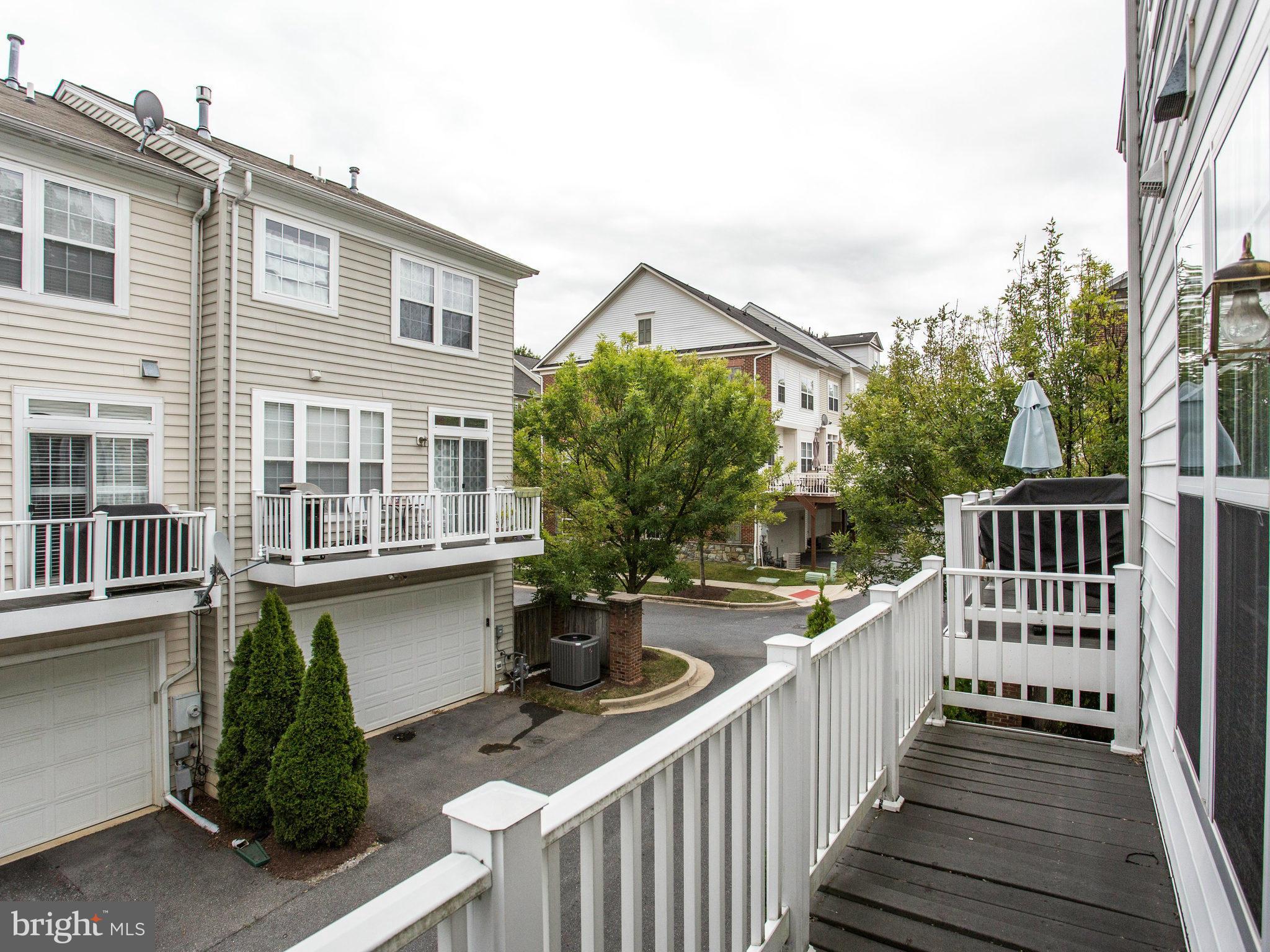 9823 Darcy Forest Drive Silver Spring, MD 20910 - Photo 14 of 30 a view of a house with backyard and deck