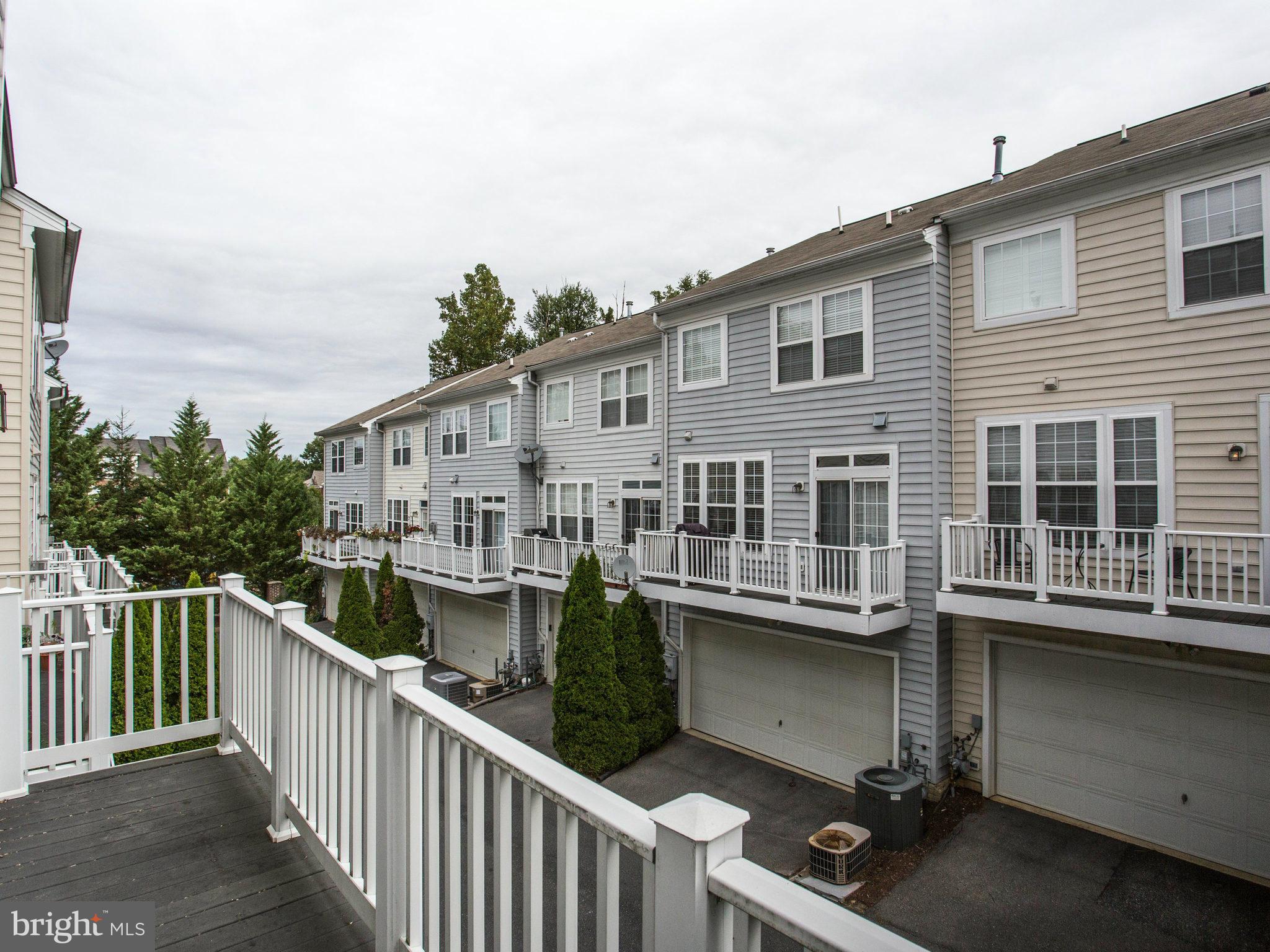 9823 Darcy Forest Drive Silver Spring, MD 20910 - Photo 15 of 30 a view of a house with a deck