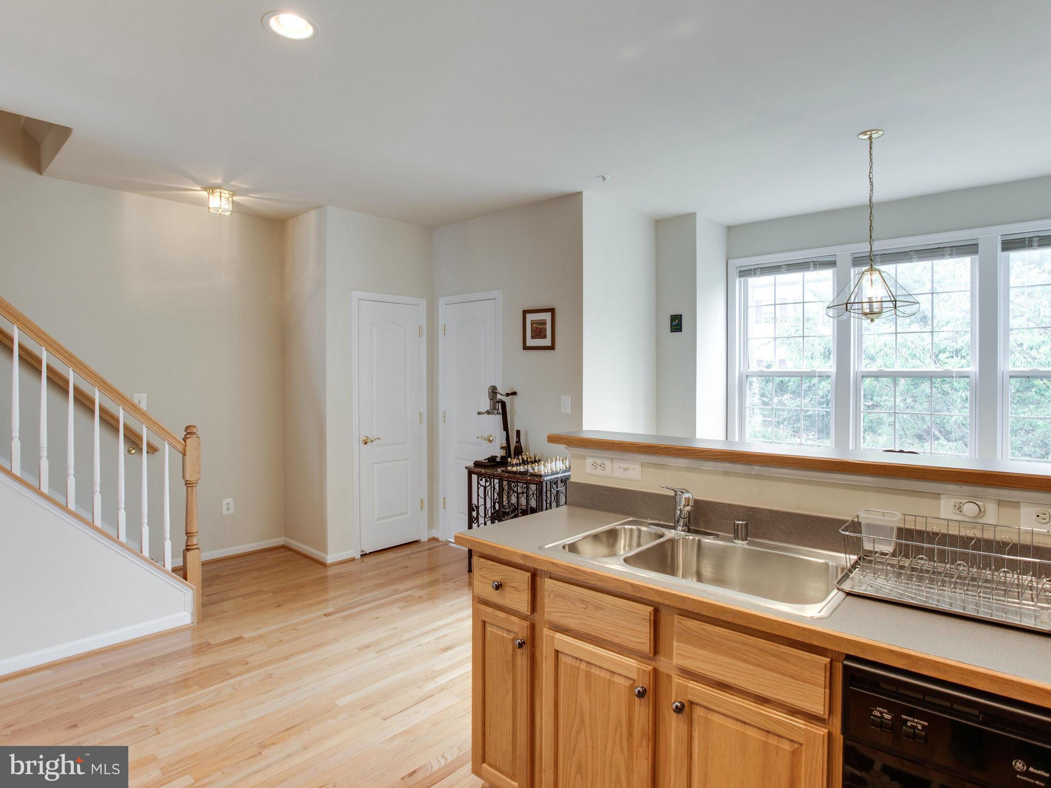 9823 Darcy Forest Drive Silver Spring, MD 20910 - Photo 19 of 30 a bathroom with a sink and a large window
