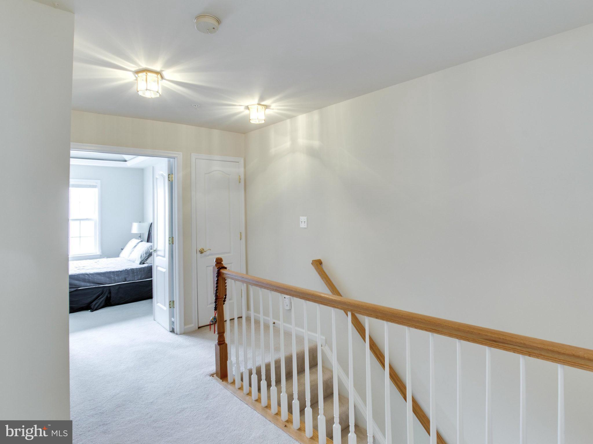 9823 Darcy Forest Drive Silver Spring, MD 20910 - Photo 23 of 30 a view of a hallway with a livingroom