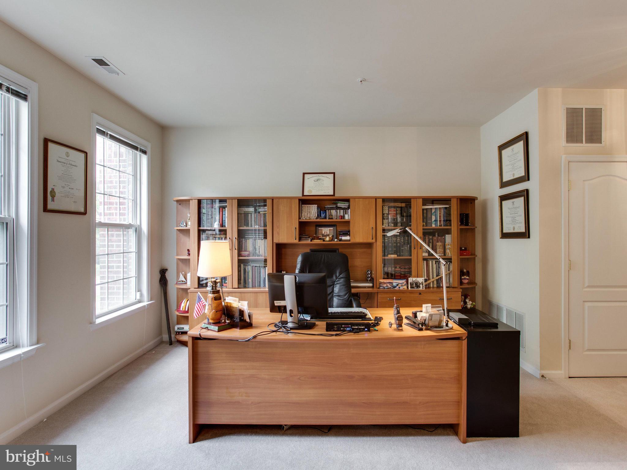 9823 Darcy Forest Drive Silver Spring, MD 20910 - Photo 5 of 30 a room with furniture and mountain view