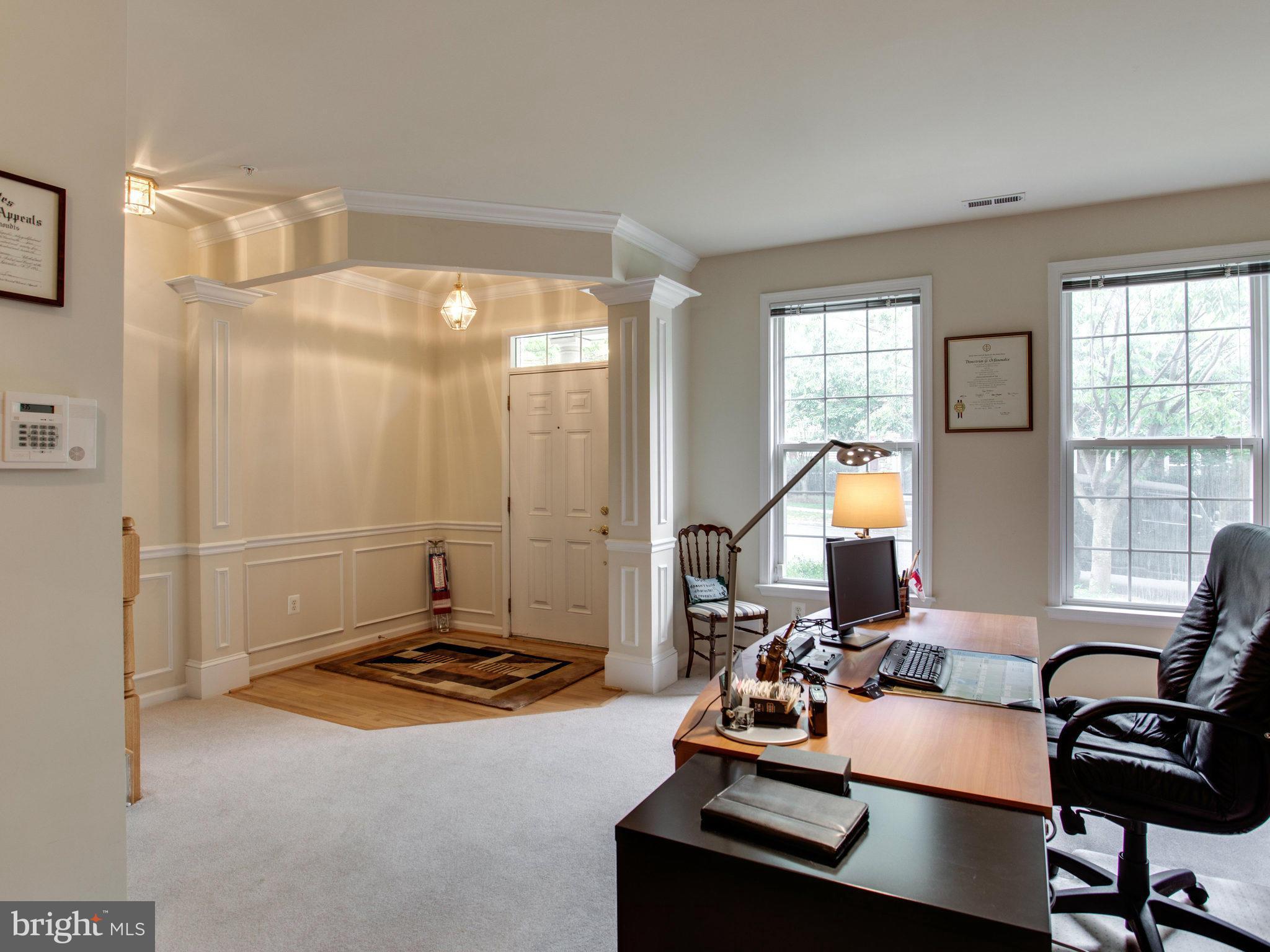 9823 Darcy Forest Drive Silver Spring, MD 20910 - Photo 7 of 30 a living room with furniture and a window