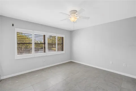 a bathroom with a sink double vanity and a mirror