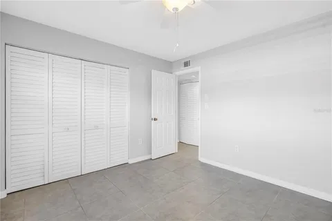 a bathroom with a shower and a toilet