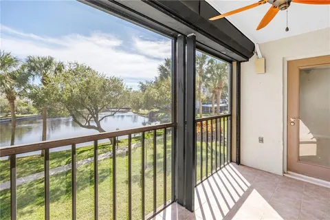 a swimming pool with outdoor seating and yard