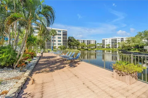 a sign that is on a brick wall