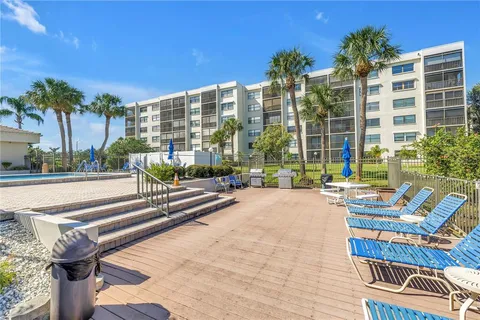 a view of kitchen with wooden floor and small window
