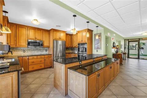 a view of a cars park in front of house