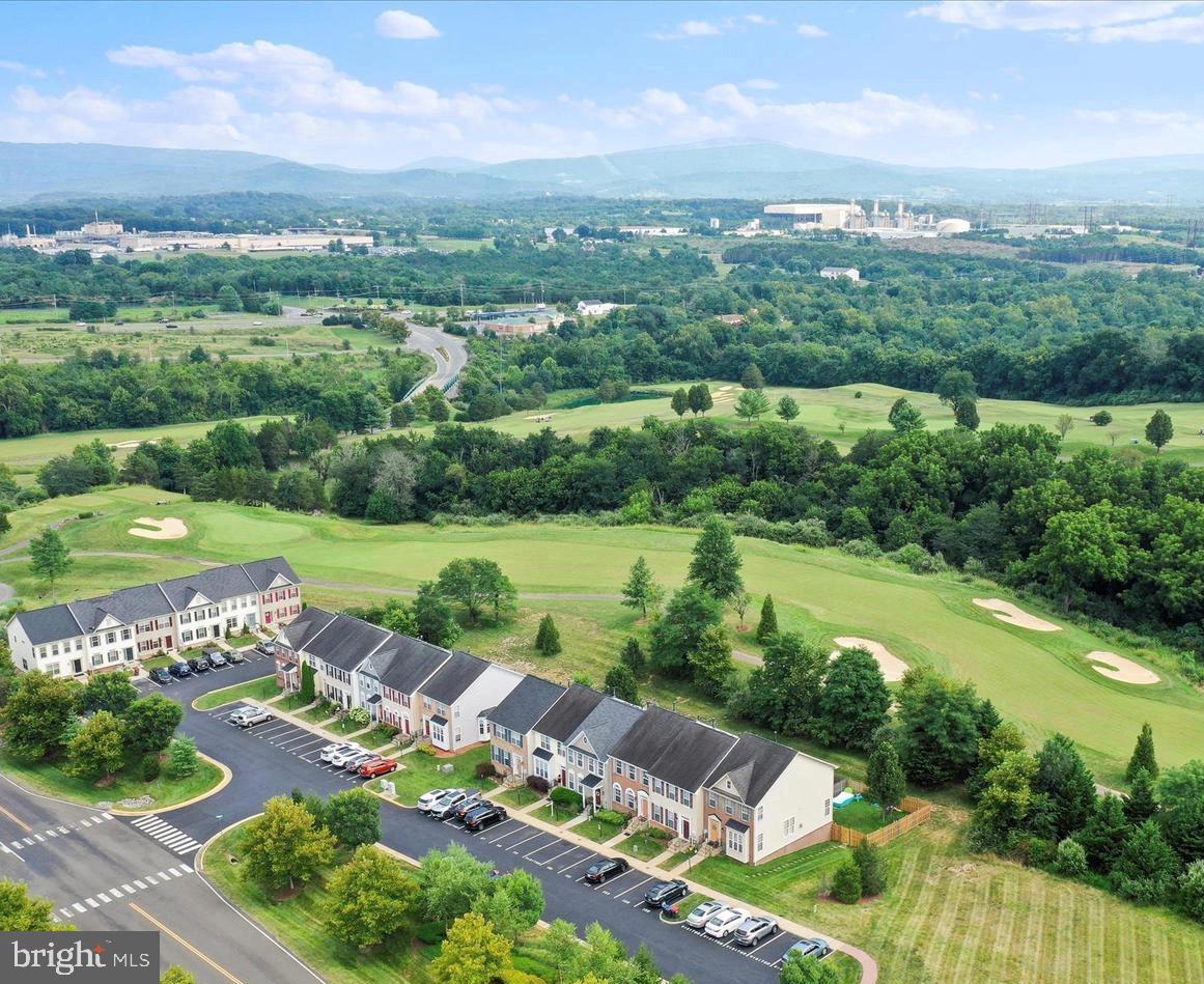 73 Spoon Square Front Royal, VA 22630 - Photo 1 of 28 an aerial view of a city with lots of green space