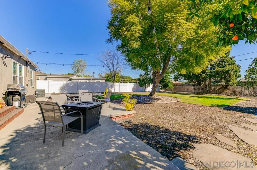 6244 Lorca Drive San Diego, CA 92115 - Photo 12 of 25 a view of a swimming pool with chairs in patio