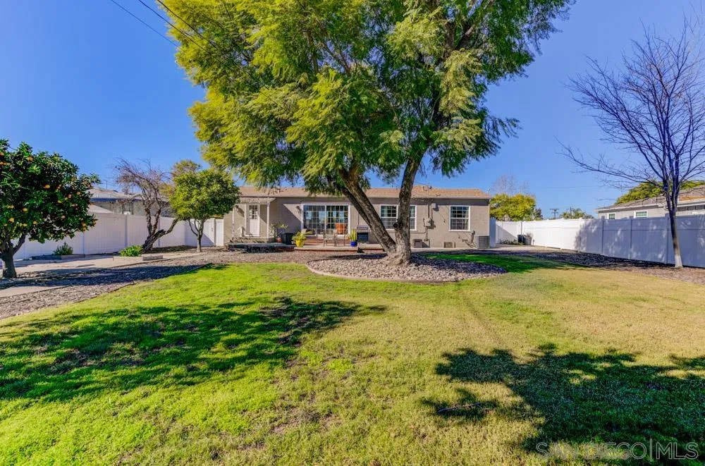 6244 Lorca Drive San Diego, CA 92115 - Photo 14 of 25 a swimming pool with outdoor seating and yard