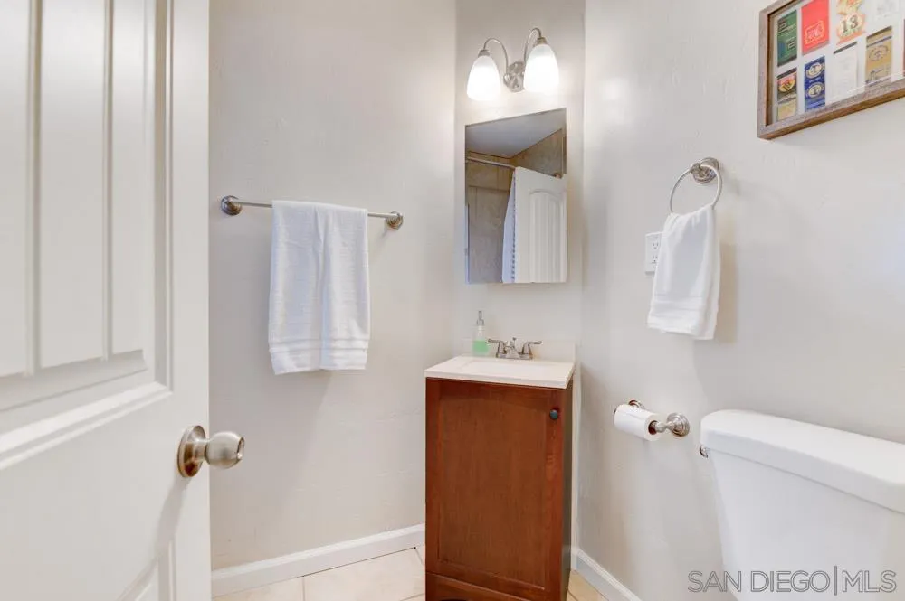 6244 Lorca Drive San Diego, CA 92115 - Photo 22 of 25 a bathroom with a shower