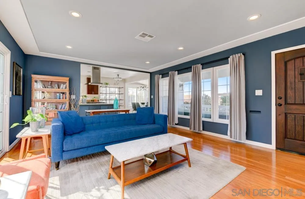 6244 Lorca Drive San Diego, CA 92115 - Photo 5 of 25 a living room with furniture and a table
