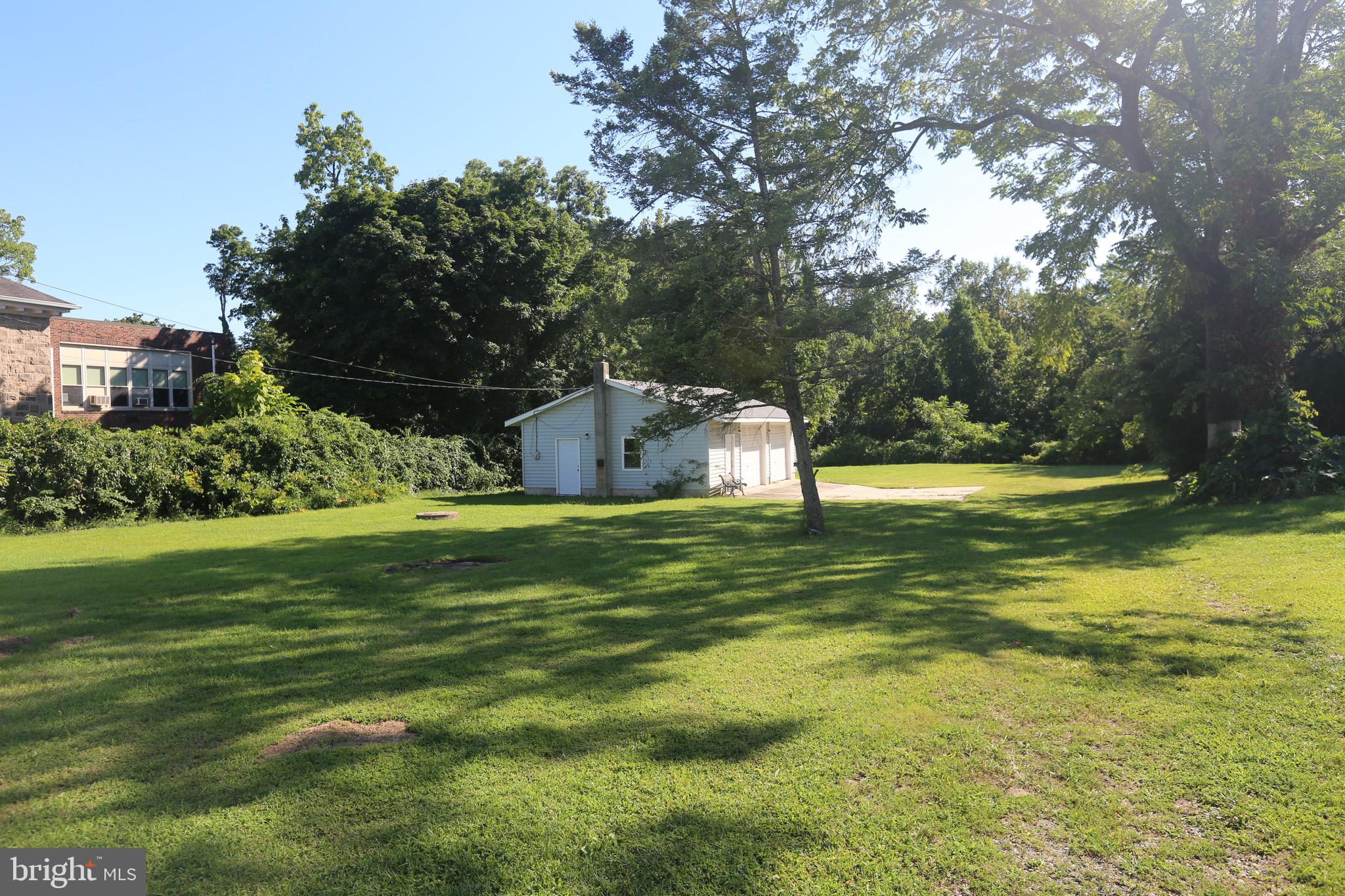 680 Main Street Sewell, NJ 08080 - Photo 5 of 7 a swimming pool with outdoor seating and yard