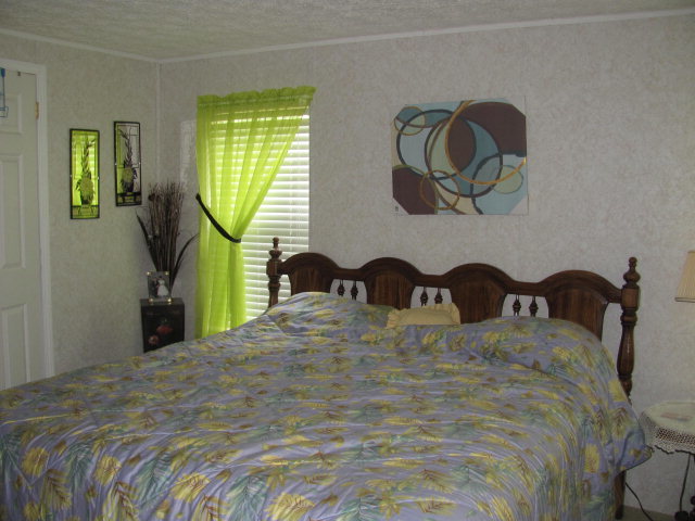 100 Cork Road, Unit 1 2 Forsyth, GA 31029 - Photo 4 of 24 a bedroom with bed and window