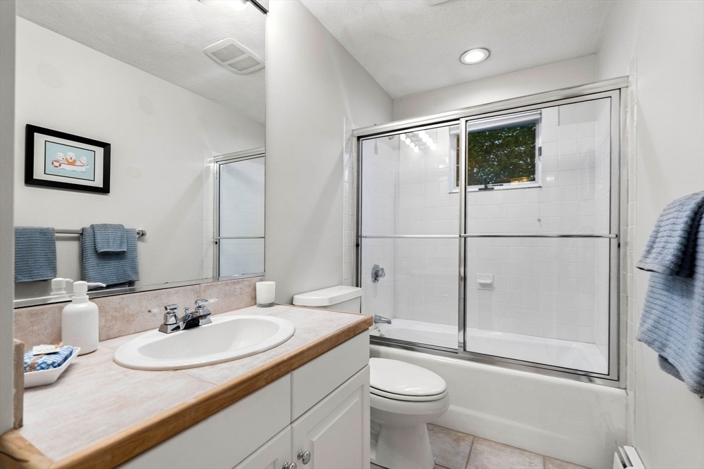53 Gerald Road Marblehead, MA 01945 - Photo 28 of 42 a bathroom with a sink toilet and shower