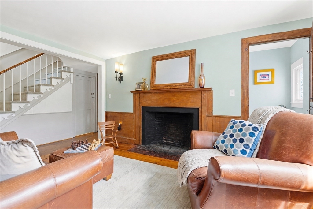 22 Stinson Road Andover, MA 01810 - Photo 13 of 40 a living room with furniture and a fireplace