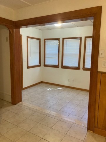 60 Berkeley Street, Unit 1 Somerville, MA 02143 - Photo 3 of 11 a view of an empty room with a window
