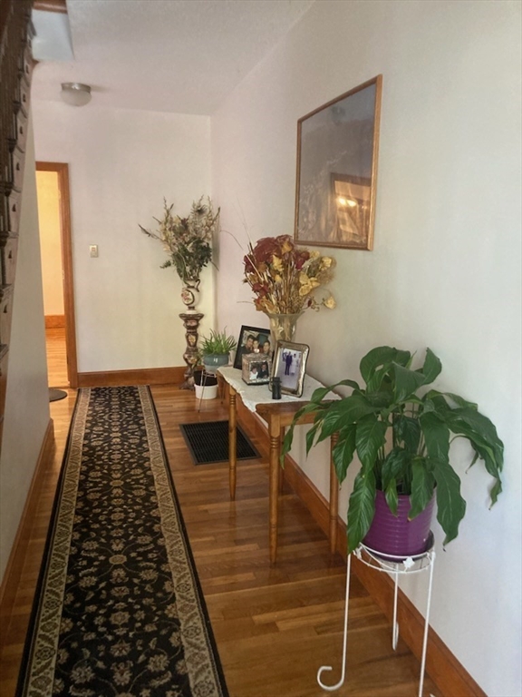 60 Berkeley Street, Unit 1 Somerville, MA 02143 - Photo 6 of 11 a vase of flowers sitting on a table