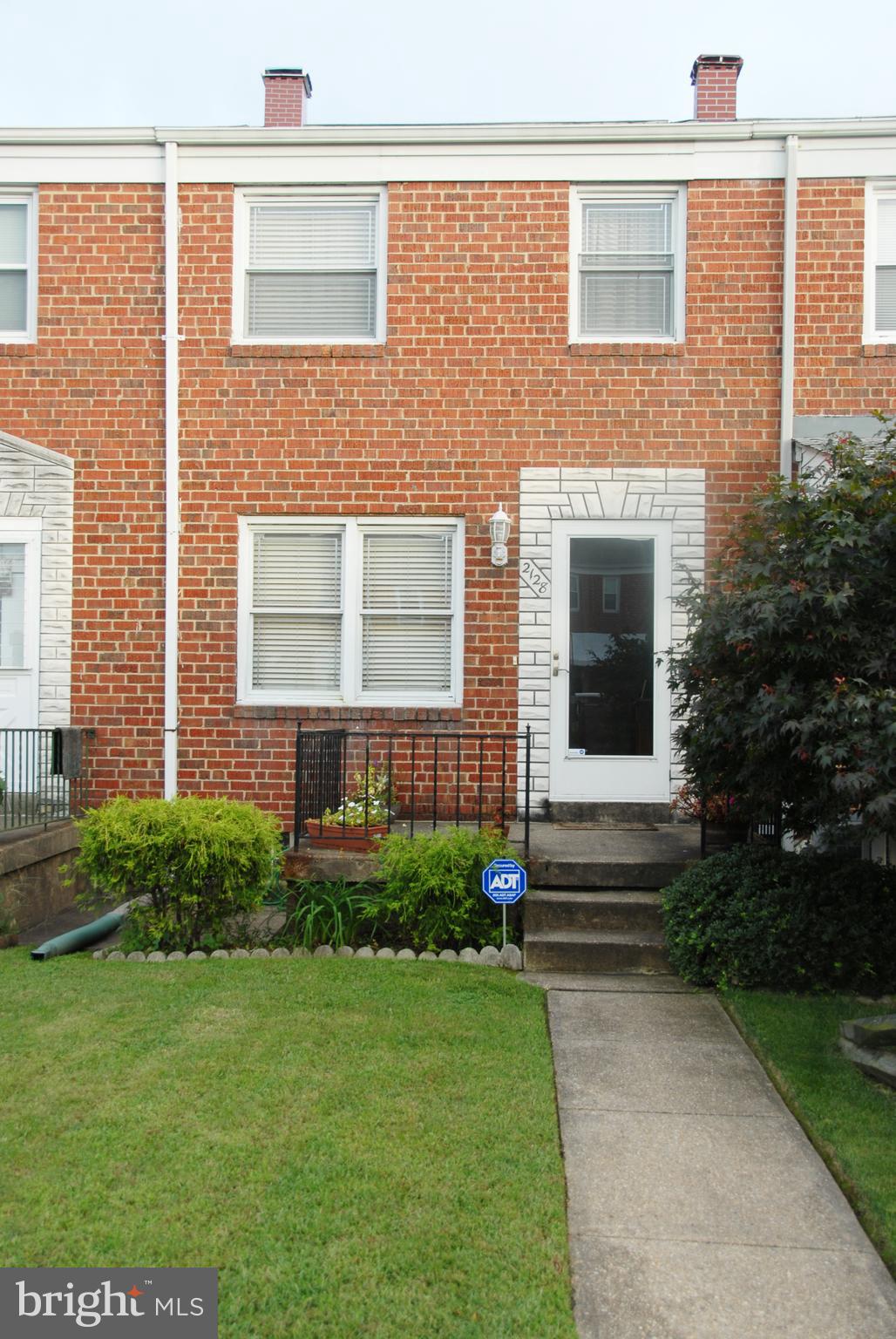 2128 Graythorn Road Baltimore, MD 21220 - Photo 1 of 20 a front view of a house with garden