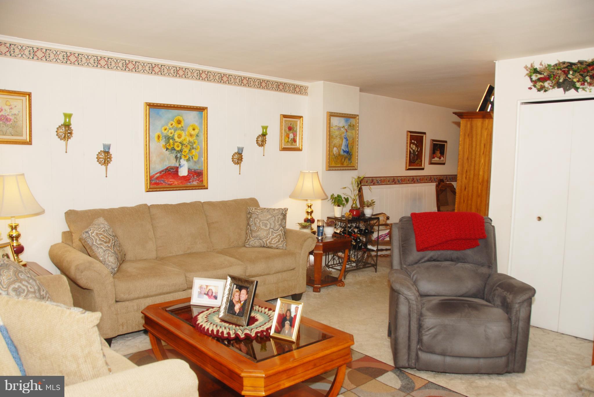 2128 Graythorn Road Baltimore, MD 21220 - Photo 2 of 20 a living room with furniture and a wooden floor