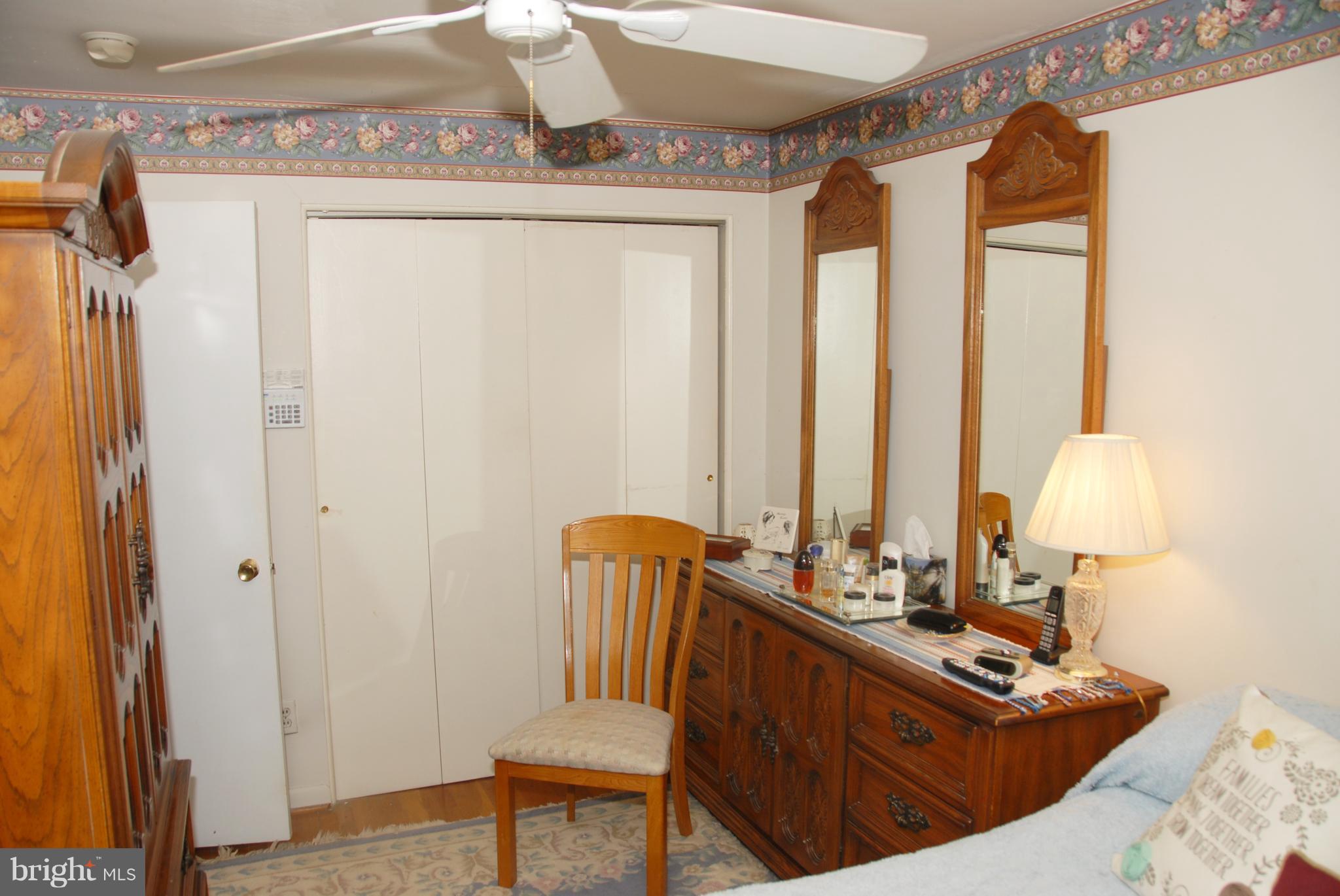2128 Graythorn Road Baltimore, MD 21220 - Photo 11 of 20 a room with a table chairs and a mirror
