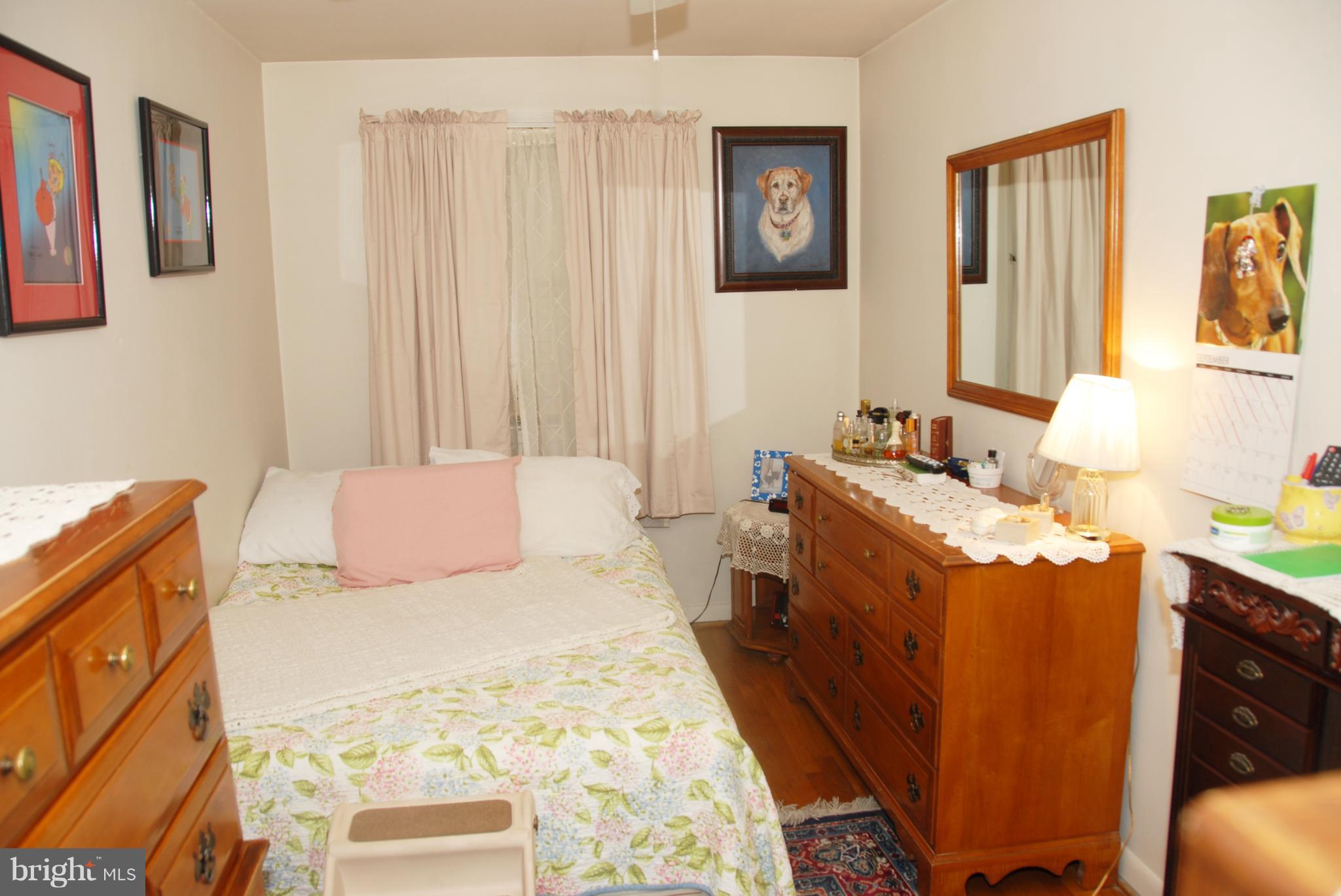 2128 Graythorn Road Baltimore, MD 21220 - Photo 12 of 20 a bedroom with a bed and wooden floor