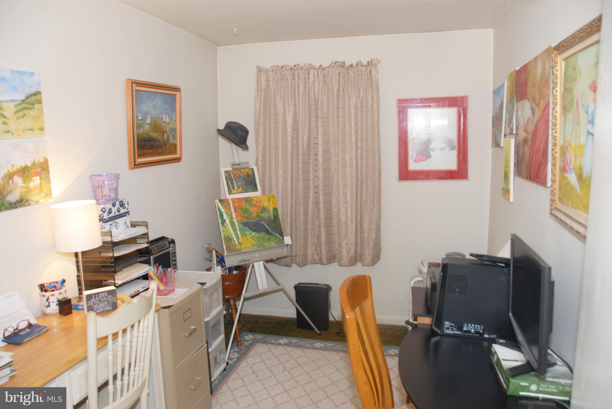 2128 Graythorn Road Baltimore, MD 21220 - Photo 13 of 20 a work room with furniture and a flat screen tv