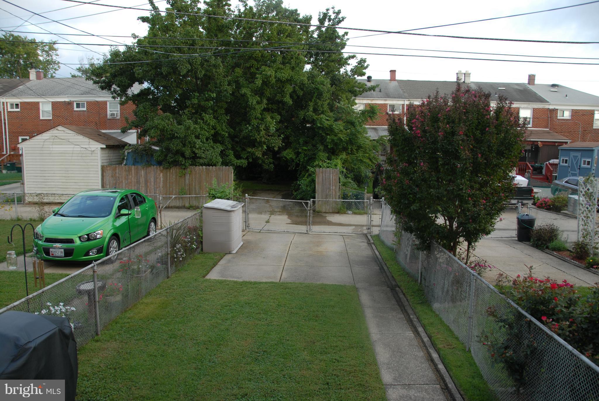 2128 Graythorn Road Baltimore, MD 21220 - Photo 20 of 20 a view of a garden with a fountain