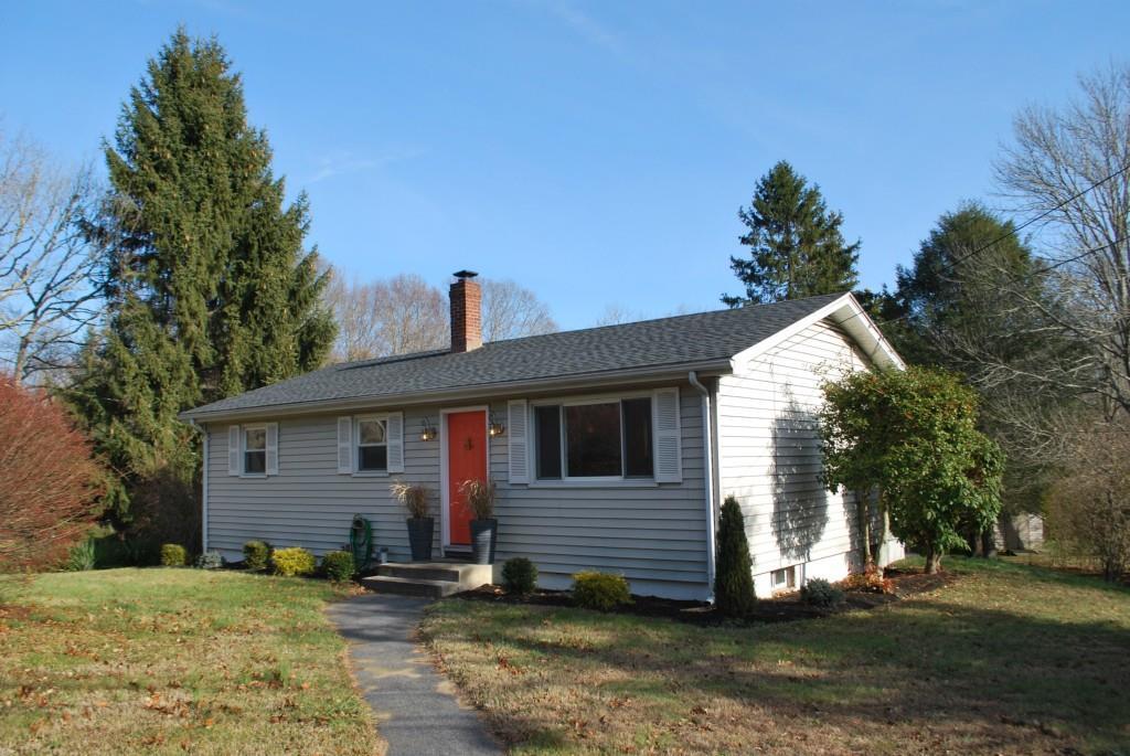78 Flanders Road Stonington, CT 06378 - Photo 1 of 1 a view of a house with a yard