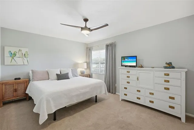 a room with walk in closet and a window