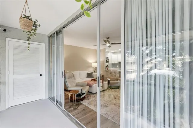 a view of a street with a tree