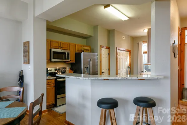 $359,000 | 10 Stoney Falls Loop, Unit 4/203, Burnsville, NC 28714