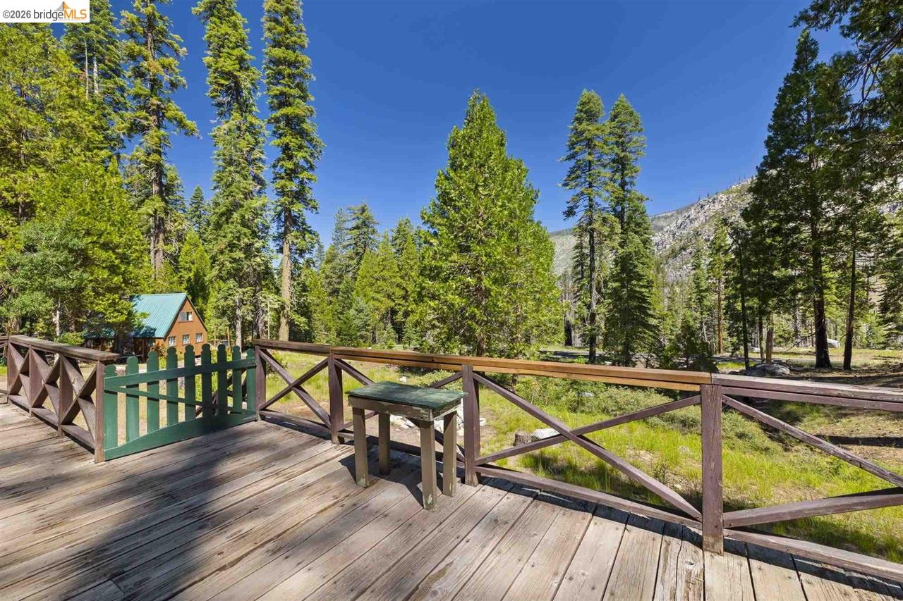 7 Riverside Tract Kyburz, CA 95720 - Photo 2 of 25 a view of a balcony with chairs