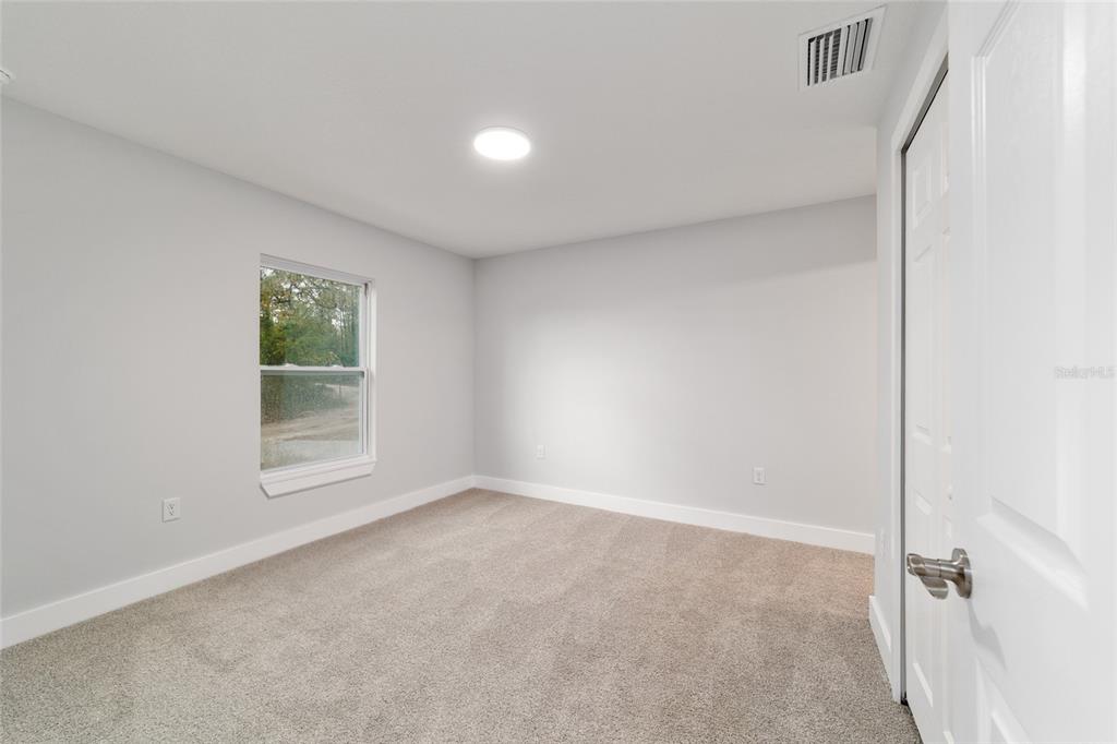 15776 Southwest 27th Lane Ocala, FL 34481 - Photo 23 of 39 a view of an empty room with a window