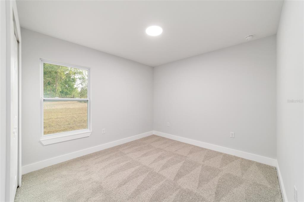 15776 Southwest 27th Lane Ocala, FL 34481 - Photo 36 of 39 an empty room with a window