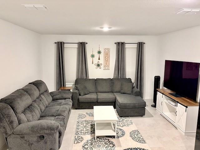 464 Reverie Way Ferris, TX 75125 - Photo 4 of 21 a living room with furniture and a flat screen tv