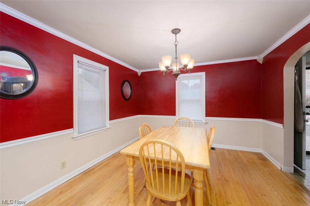 241 Everhard Road Southwest North Canton, OH 44709 - Photo 7 of 21 Dining room with light wood flooring and chair rail