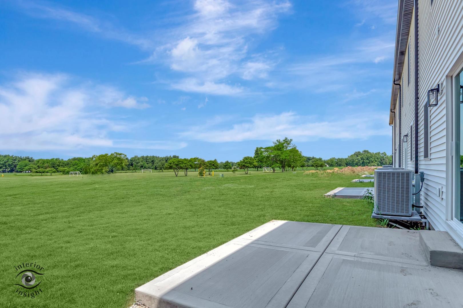 1321 Sioux Turn Kankakee, IL 60901 - Photo 28 of 34 a view of a lake with a yard