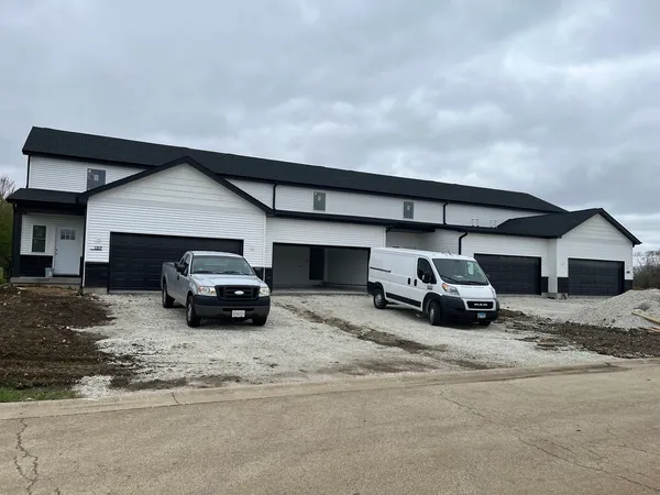 a car parked in front of garage