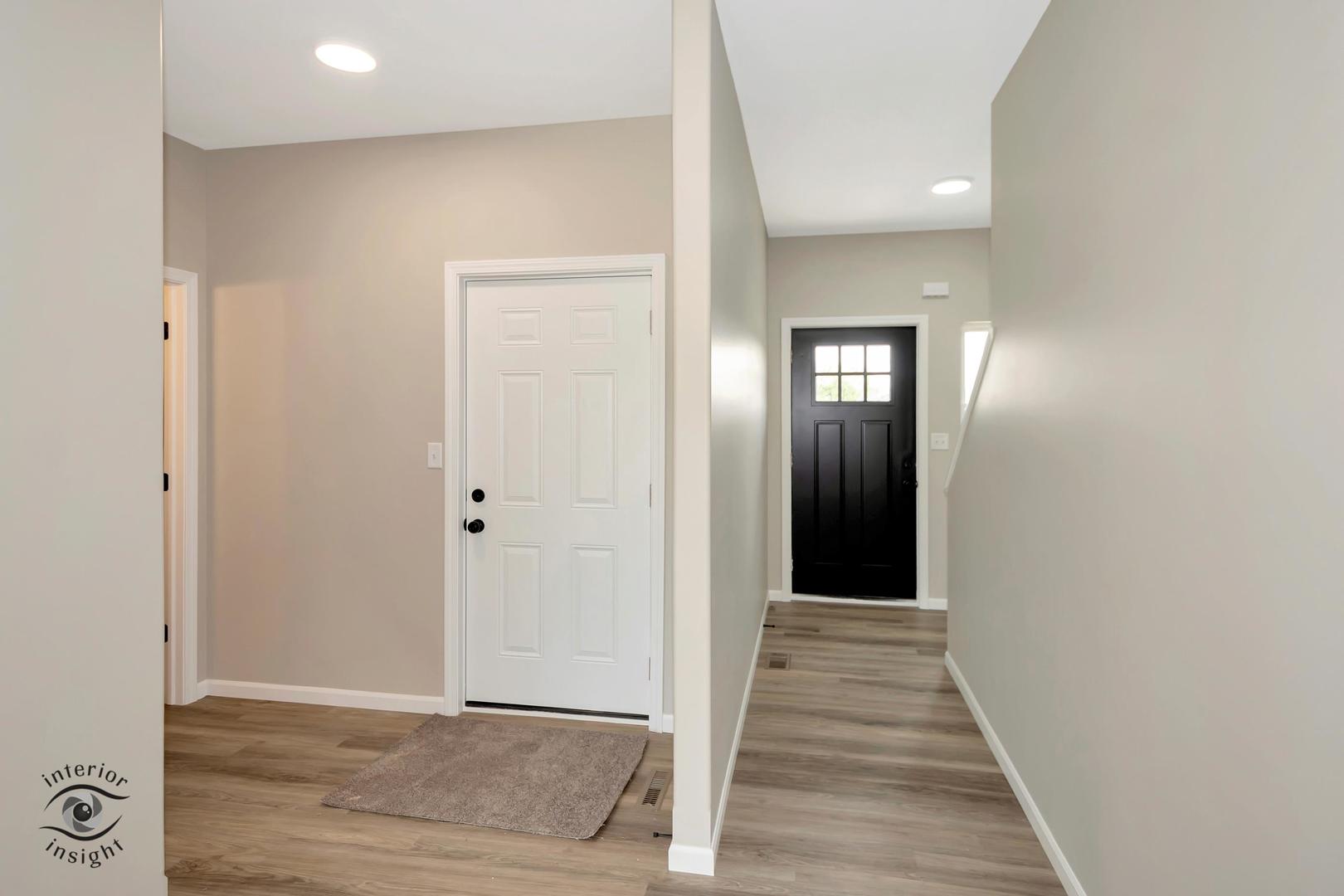 1321 Sioux Turn Kankakee, IL 60901 - Photo 6 of 34 a view of a hallway with wooden floor