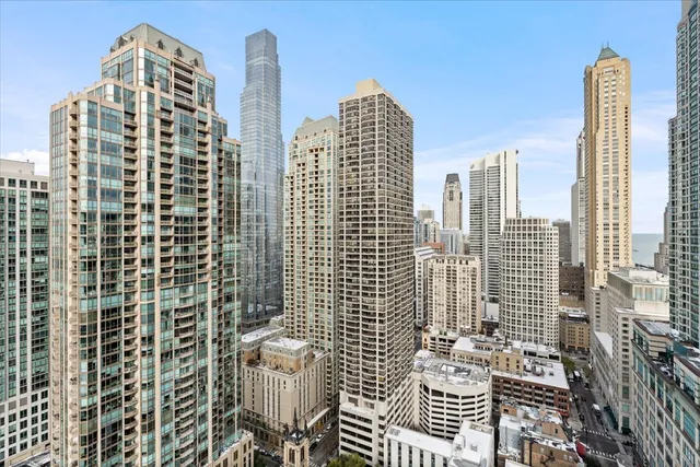 a view of a city with tall buildings