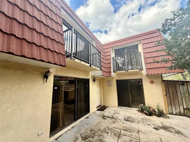a view of a building with a wooden door