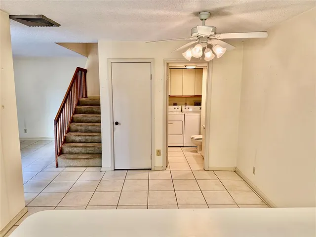 a view of an entryway and chandelier